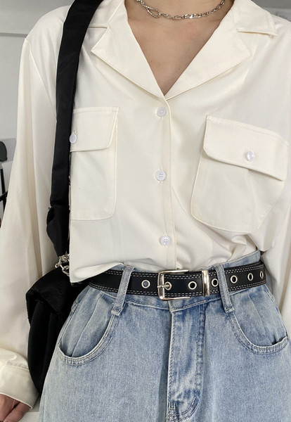 Ženski remen s metalnim ušicama