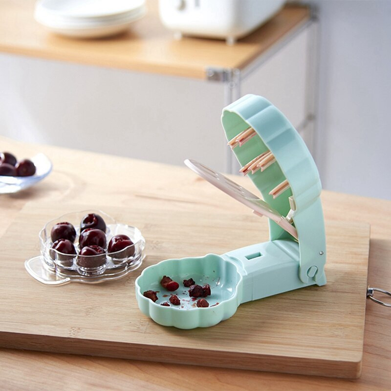 Odstranjivač koštica trešanja jednostavan je kućni odstranjivač koštica trešanja koji može ukloniti 6 koštica trešnje odjednom