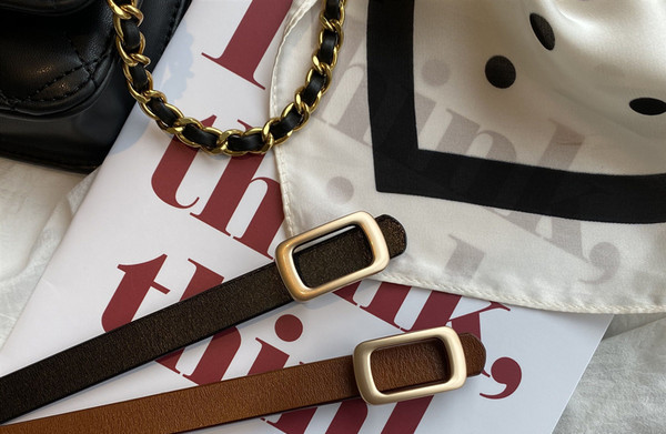 Ženski remen od umjetne kože - crne i smeđe boje