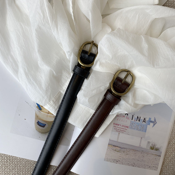 Ženski tanki kožni remen crne boje