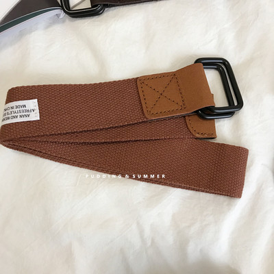 Ženski tekstilni remen sa metalnom kopčom