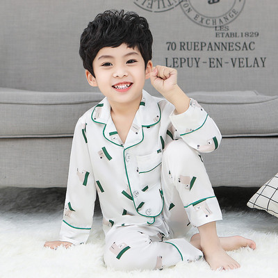 Dječja dvodijelna pidžama za dječake s gumbima i printom