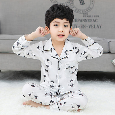 Dječja dvodijelna pidžama za dječake s gumbima i printom
