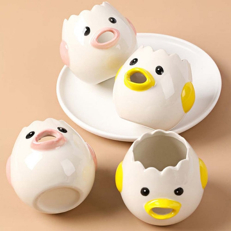 Mieli keraminiai kiaušiniai, balti tryniai, skirti vištienos kiaušinio trynio baltymui Animacinių filmų vištienos kiaušinių atskirtuvai virtuvės įtaisai