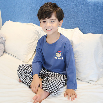 Dvojdielne detské pyžamo - blúzka a kockovaný spodný diel