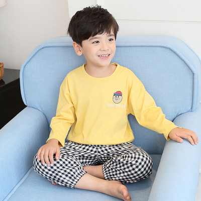 Dvojdielne detské pyžamo - blúzka a kockovaný spodný diel