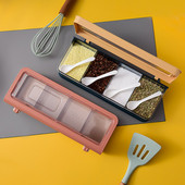 Priehľadná soľnička a korenička so štyrmi mriežkami, sada korenia na korenie v severskej kuchyni, úložný box na korenie