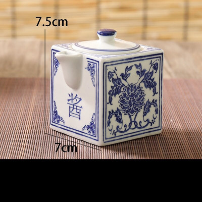 Sada modrých a bielych keramických dóz, kuchynské čínske vintage korenie, soľ, cukor, glutaman sodný, ocot, chilli, sójová fľaša