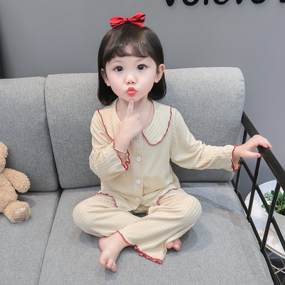 Dvojdielna pyžamová súprava s jednofarebným vzorom, dlhými rukávmi a zapínaním na gombíky