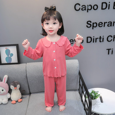 Dvojdielna pyžamová súprava s jednofarebným vzorom, dlhými rukávmi a zapínaním na gombíky