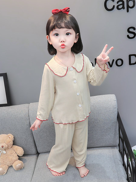 Dvojdielna pyžamová súprava s jednofarebným vzorom, dlhými rukávmi a zapínaním na gombíky