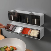 Kuchynský stojan na koreniny, korenie a soľ, sada dóz s korením a organizér na korenie s lyžičkami.