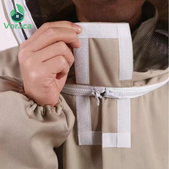 Επαγγελματικό αεριζόμενο ολόσωμο μελισσοκομικό κοστούμι με δερμάτινα γάντια Unisex Σχεδίαση σιαμέζικα ρούχα κατά της μέλισσας Μπεζ παλτό κατά της μέλισσας