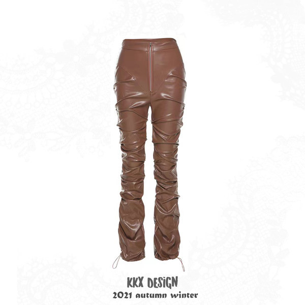 Baltos plonos odinės kelnės