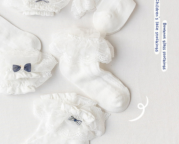 Vaikiškos kojinės su siuvinėjimais ir nėriniais