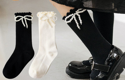 Dviejų spalvų vaikiškos kojinės su kaspinu