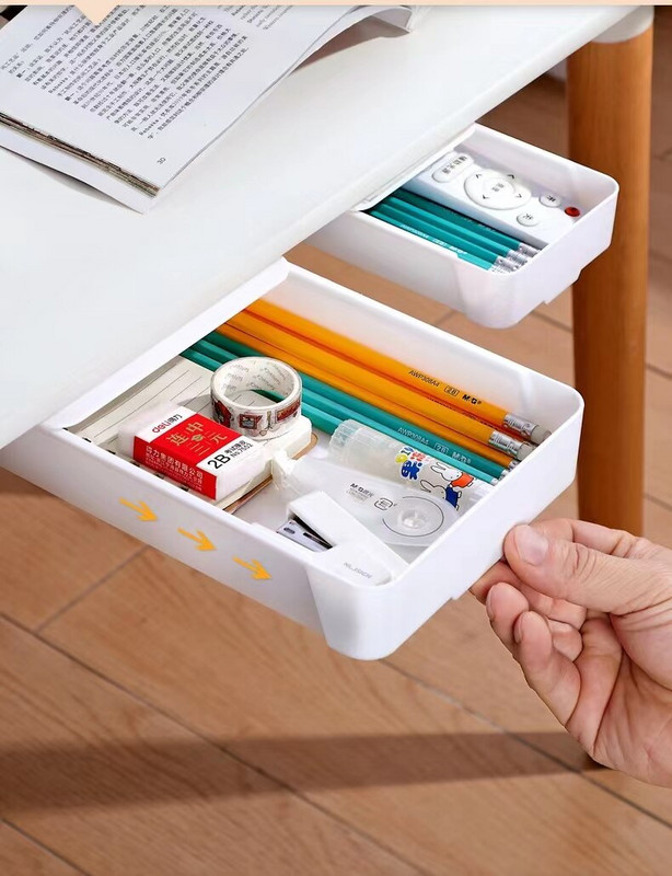 Slēptās atvilktnes veida uzglabāšanas kaste zem rakstāmgalda Biroja rakstāmgalda apakša Ielīmējiet kancelejas piederumu kaste Kopmītne Dažādu uzglabāšanas šķirošanas kaste
