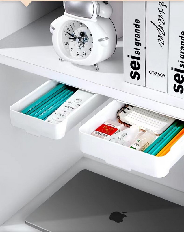 Slēptās atvilktnes veida uzglabāšanas kaste zem rakstāmgalda Biroja rakstāmgalda apakša Ielīmējiet kancelejas piederumu kaste Kopmītne Dažādu uzglabāšanas šķirošanas kaste