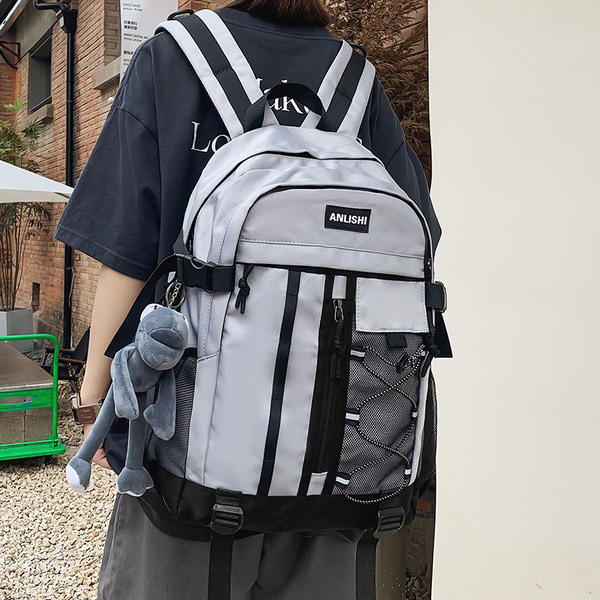 Tekstilni muški ruksak s vezicama i patentnim zatvaračem