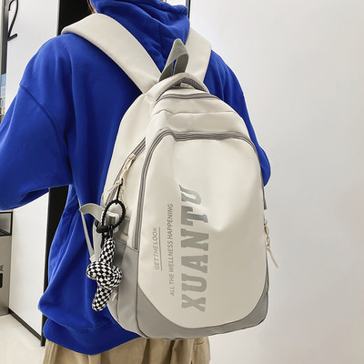 Muški ruksak s privjeskom za ključeve