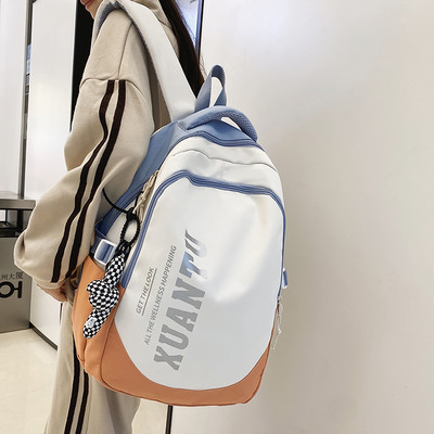 Muški ruksak s privjeskom za ključeve