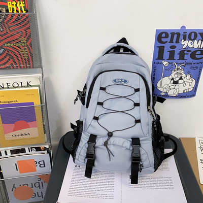 Pánsky textilný batoh so zapínaním na zips a bočnými vreckami