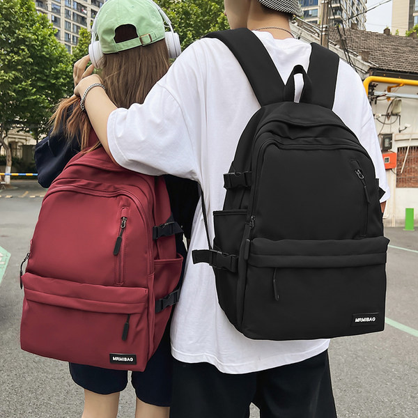 Muški ležerni tekstilni ruksak s logotipom i prednjim džepom