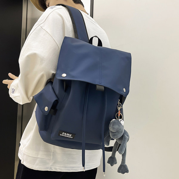 Modni uniseks tekstilni ruksak s logotipom i vezicama