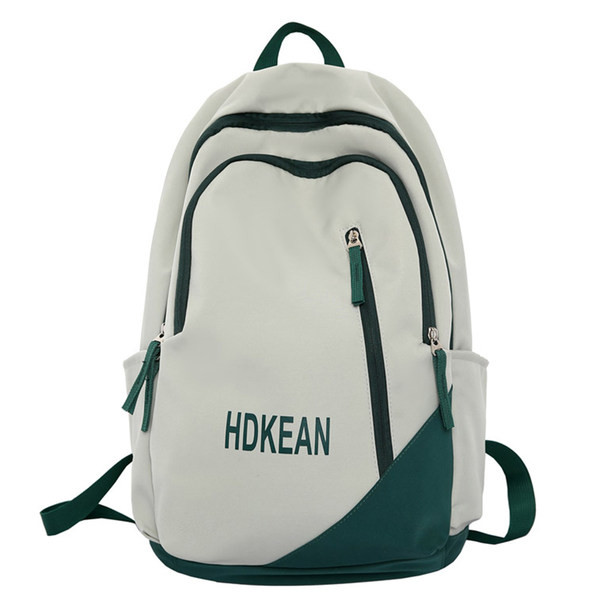 Muški ruksak sa patentnim zatvaračima i natpisom