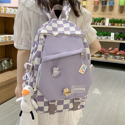 Ležérny textilný batoh s aplikáciou a nápisom pre mužov