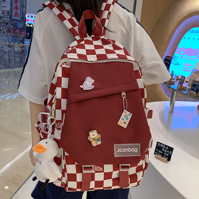 Ležérny textilný batoh s aplikáciou a nápisom pre mužov