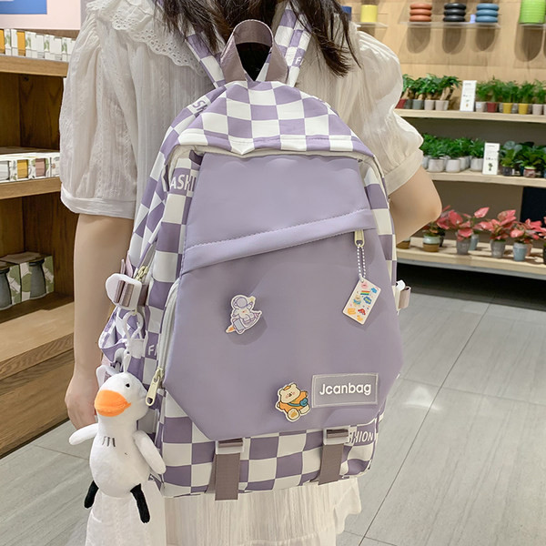 Ležérny textilný batoh s aplikáciou a nápisom pre mužov