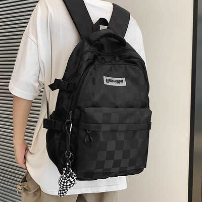 Muški ruksak od tekstila sa natpisom i 3D elementom