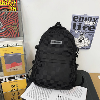 Muški ruksak od tekstila sa natpisom i 3D elementom