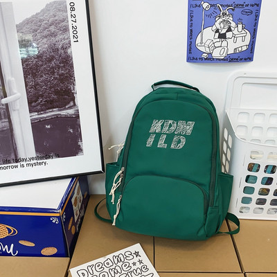 Muški ležerni ruksak s privjeskom za ključeve i natpisom