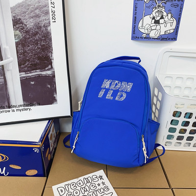 Muški ležerni ruksak s privjeskom za ključeve i natpisom