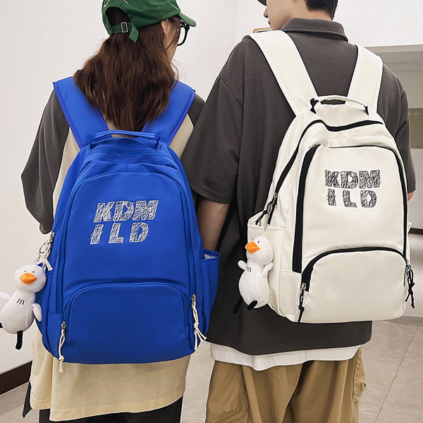 Muški ležerni ruksak s privjeskom za ključeve i natpisom