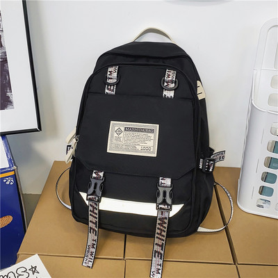 Moderan muški ruksak s natpisom i 3D elementom