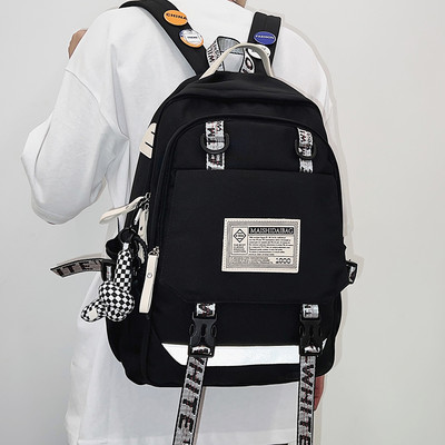 Moderan muški ruksak s natpisom i 3D elementom