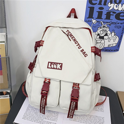 Rucsac modern pentru bărbați din material textil cu inscripție și element 3D