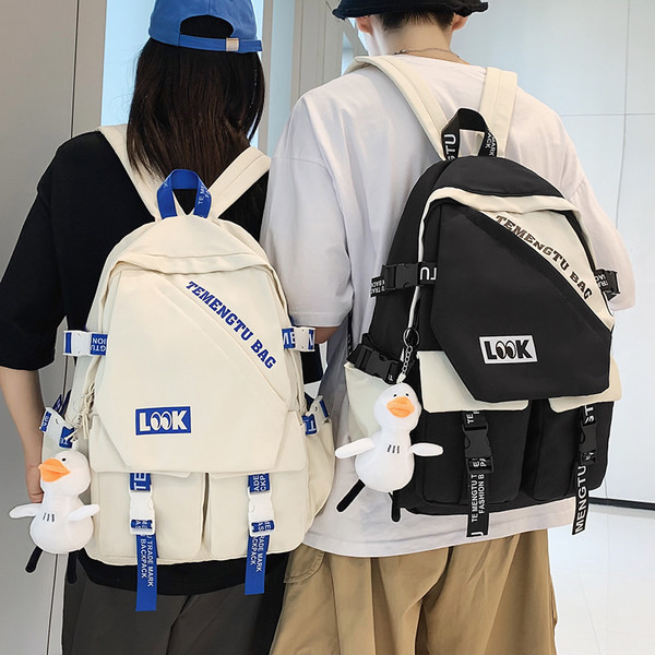 Rucsac modern pentru bărbați din material textil cu inscripție și element 3D