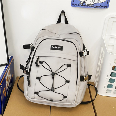 Pánsky textilný batoh s prednými zaväzovaniami na vreckách a nápisom