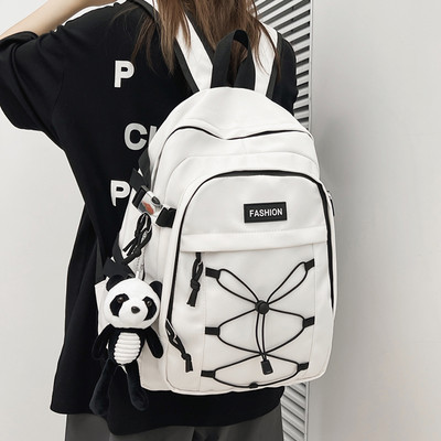 Pánsky textilný batoh s prednými zaväzovaniami na vreckách a nápisom