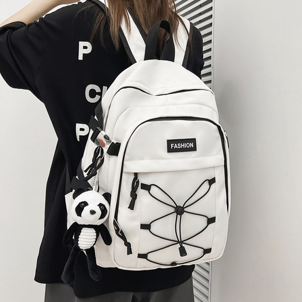 Pánsky textilný batoh s prednými zaväzovaniami na vreckách a nápisom