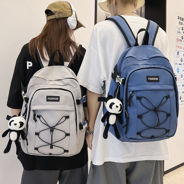 Pánsky textilný batoh s prednými zaväzovaniami na vreckách a nápisom