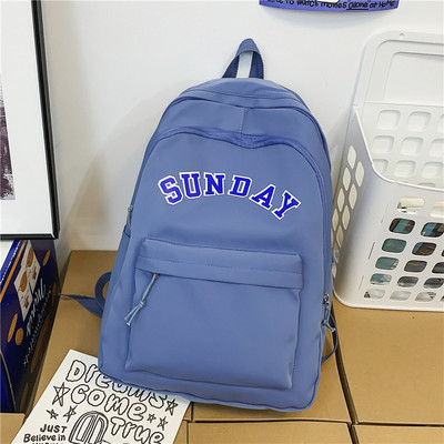 Muški ležerni ruksak s natpisom i privjeskom za ključeve