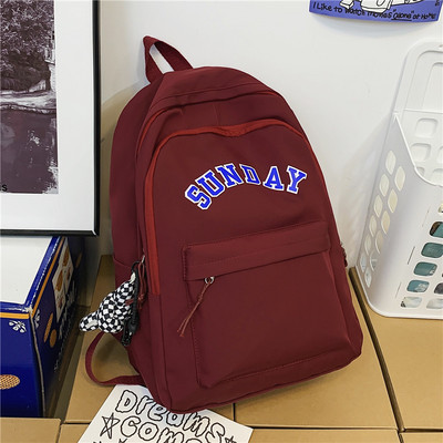 Muški ležerni ruksak s natpisom i privjeskom za ključeve