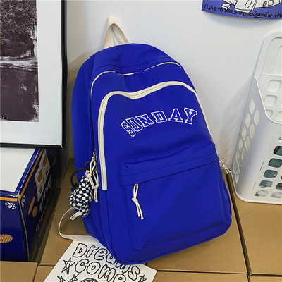 Muški ležerni ruksak s natpisom i privjeskom za ključeve