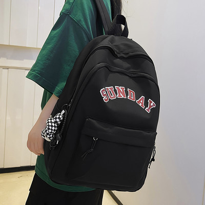 Muški ležerni ruksak s natpisom i privjeskom za ključeve