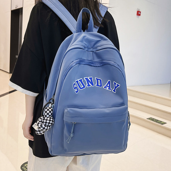 Muški ležerni ruksak s natpisom i privjeskom za ključeve